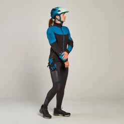 Rockrider VESTE HIVER VTT FEMME TURQUOISE NOIR -Accessoires De Vélo veste hiver vtt femme turquoise noir 1